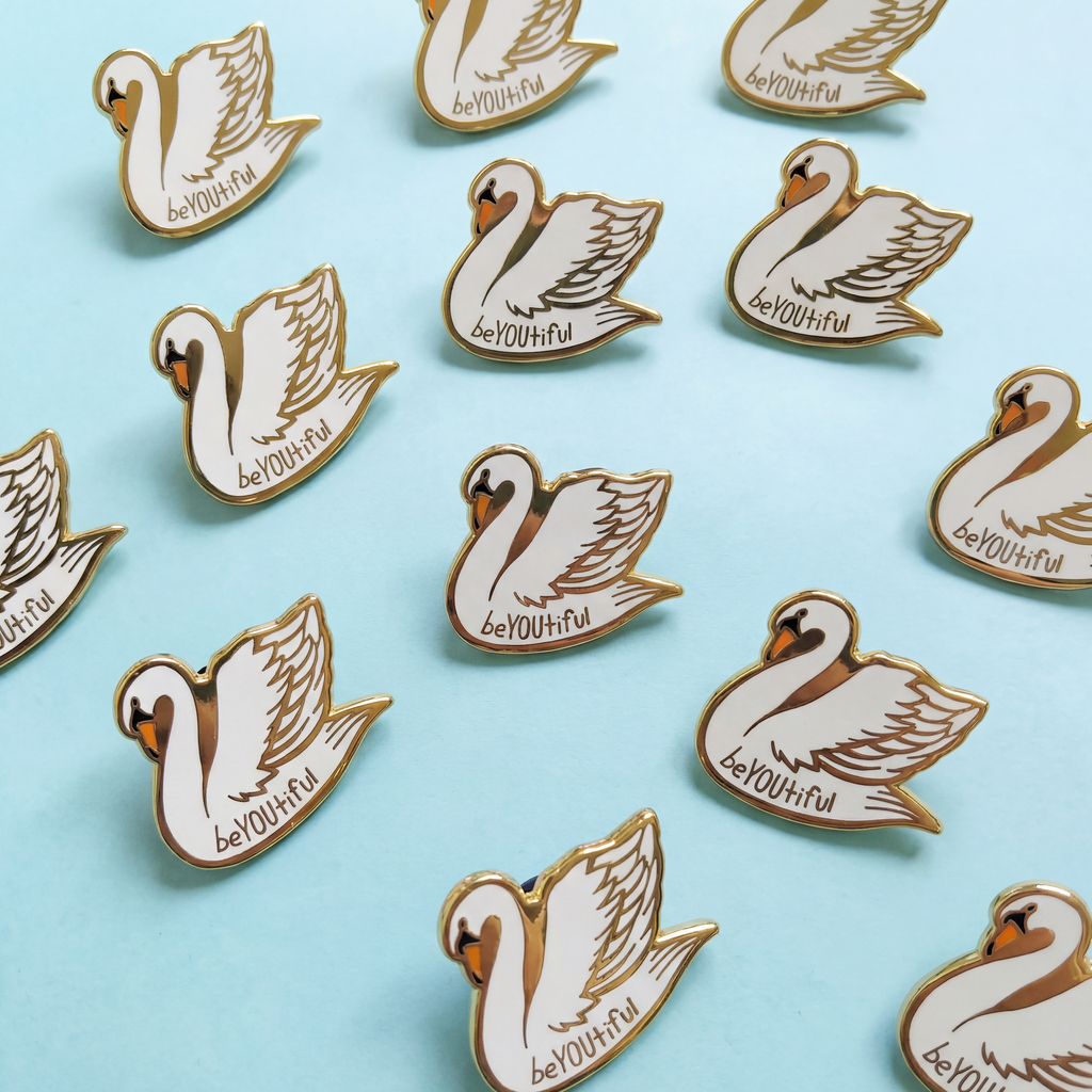 You Are Naturally Beautiful When You Are Yourself Swan Enamel Pin in White and Gold