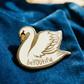 You Are Naturally Beautiful When You Are Yourself Swan Enamel Pin in White and Gold