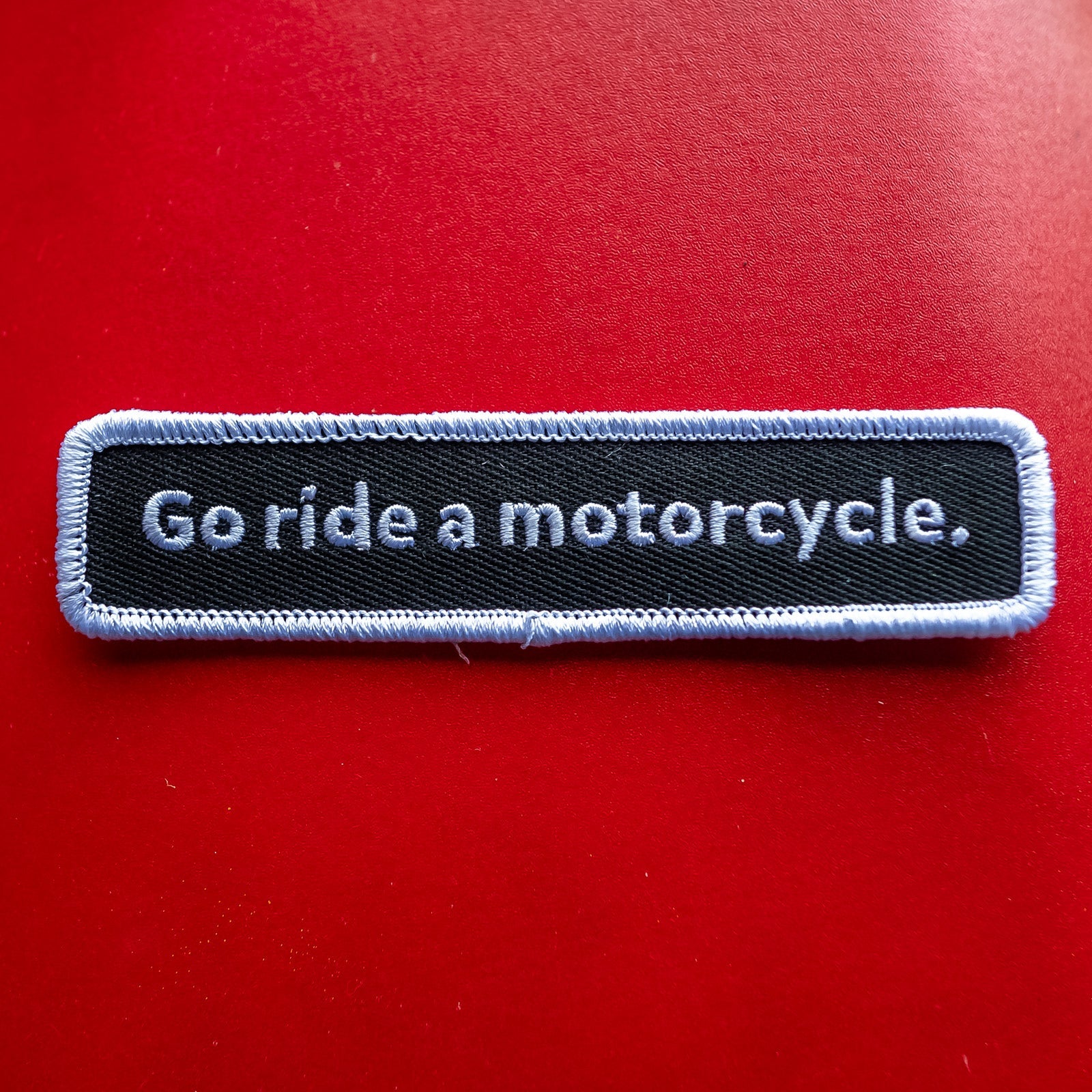 "Go ride a motorcycle" Linear Patch